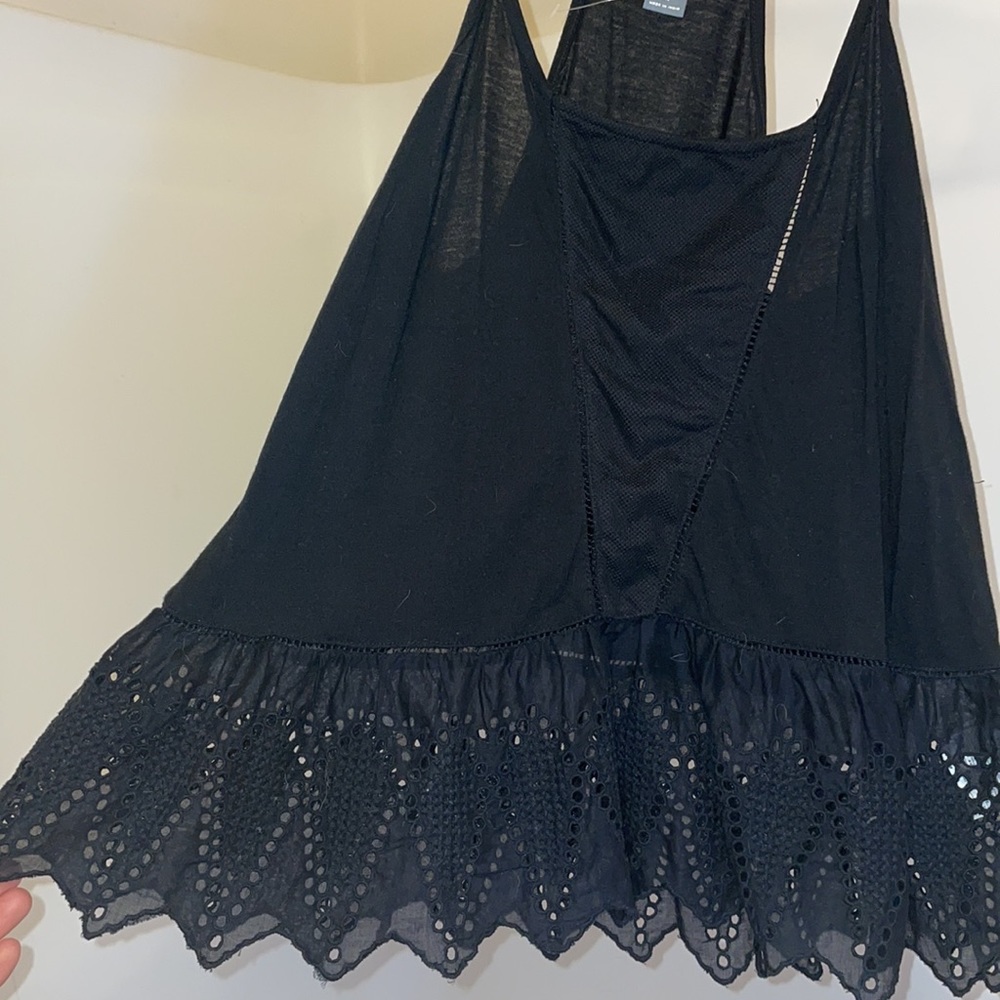 Eyelet detailed peplum tank